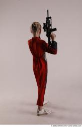 DENISA WITH TWO GUNS